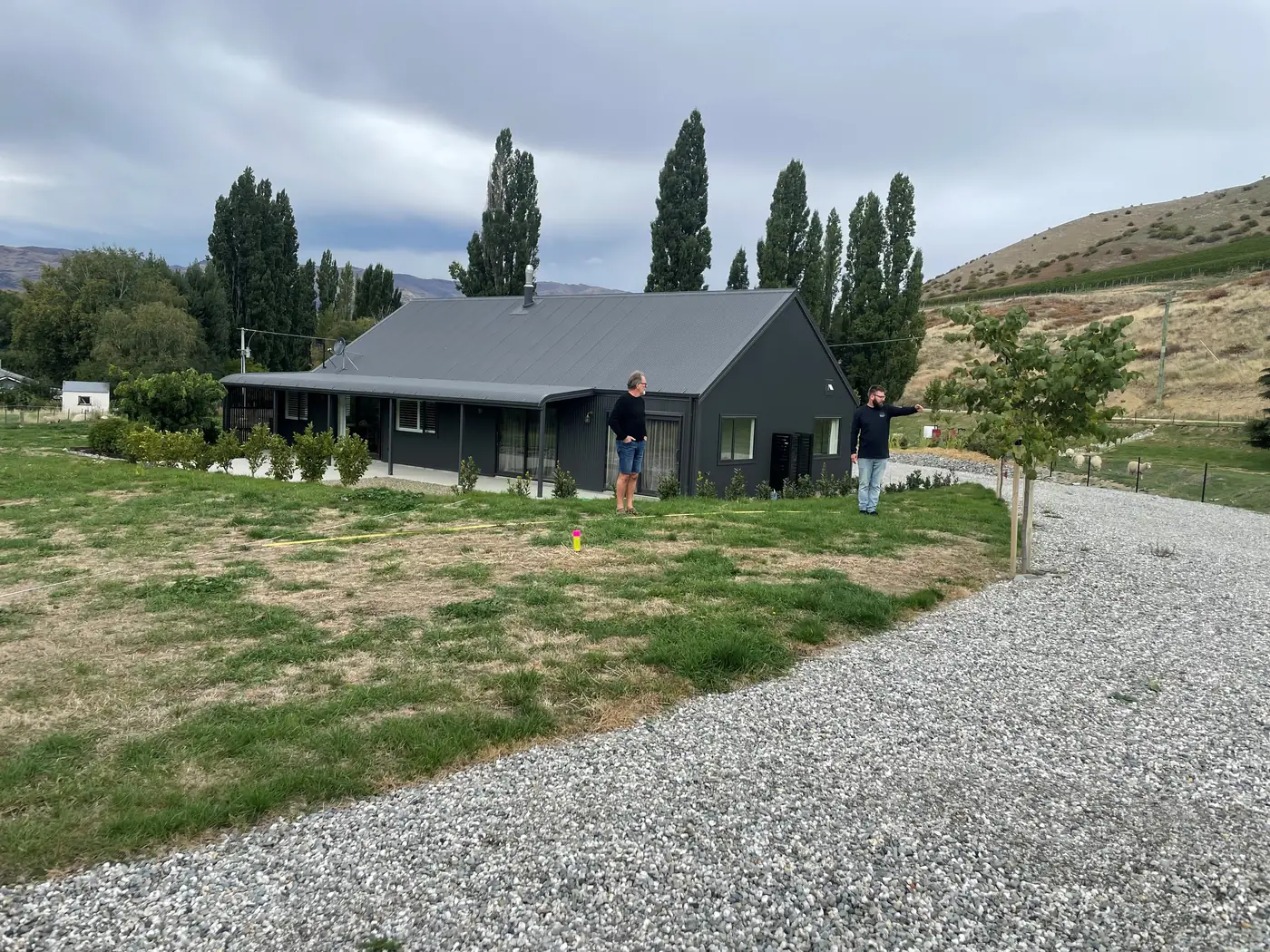 A new build site in Central Otago with the clients walking the section